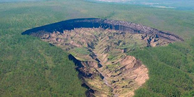 The Batagaika Crater in Siberia, which is widening every year.