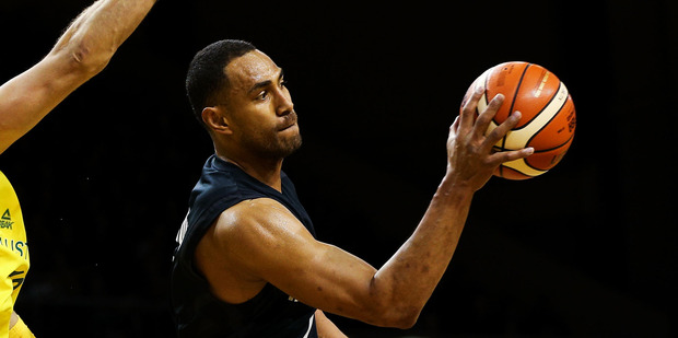 Mika Vukona passes against the Boomers. Photo / Getty Images