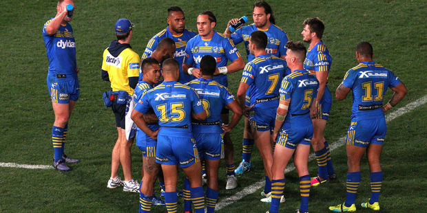 The Eels look dejected after the round 11 NRL match against the Melbourne Storm. Photo / Getty