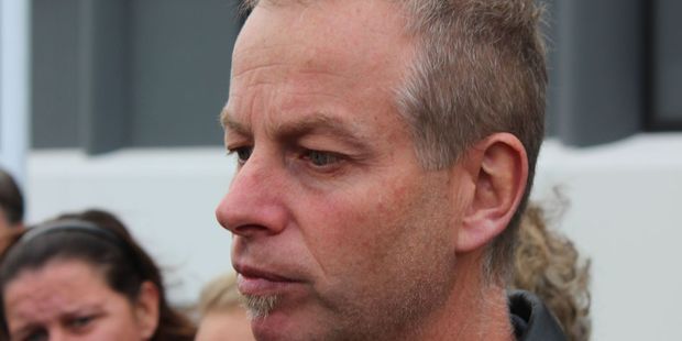 Samantha Kudeweh's husband Richard speaking outside Hamilton District Court yesterday morning. He is flanked by Samantha's sister Desiree Stephens and niece Brooke Allan.