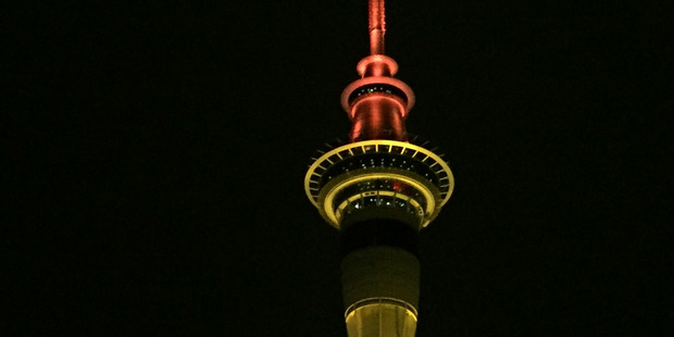 The Sky City Sky Tower is illuminated orange for the 40 Hour Famine this weekend. Photo / Greg Bowker