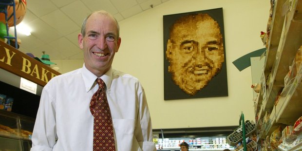 Maurice Bennett in front of his toast mural of Jonah Lomu at his New World supermarket in Island Bay, Wellington. Photo / Mark Mitchell