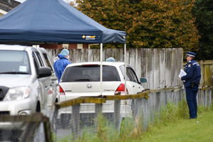 Police at the home where the three-month-old baby lived on 19th Ave, Tauranga. Photo / George Novak