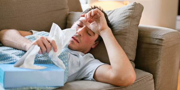 My boyfriend is completely immobilised when he comes down with the man-flu. Photo / iStock