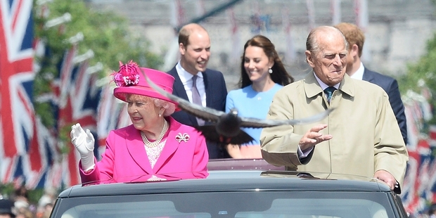 The Queen and Prince Philip will go head to head with their son and daughter-in-law. Photo / AP