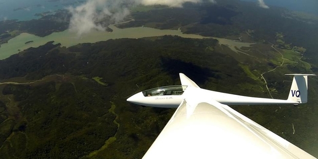 Pilot Bernie Massey soars over Waikare Inlet in the Bay of Islands.