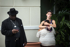 People grieve outside a Hampton Inn & Suites hotel, which turned into a hub for families and friends waiting to hear about loved ones in Orlando. Photo / AP