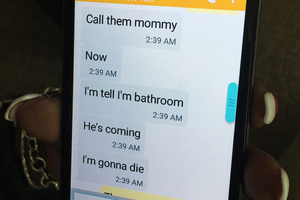 Mina Justice shows text messages she received from her son Eddie Justice at Pulse nightclub. Photo / AP