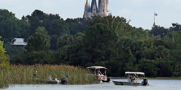Florida Fish and Wildlife Conservation Officers search for the body of the toddler. Photo / AP