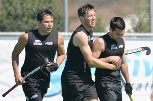 George Muir, Simon Child and Nick Ross of New Zealand celebrate scoring a goal. Photo / Getty Images
