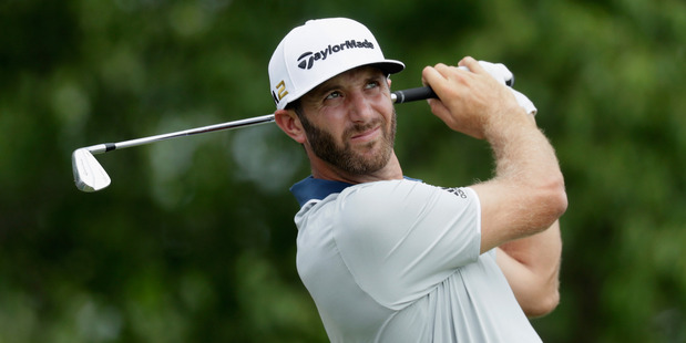 Dustin Johnson hits a shot during a practice round prior to the U.S. Open. Photo / Getty Images