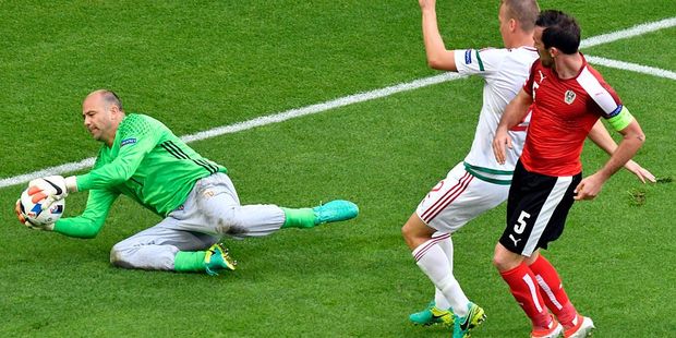 Hungarian goalkeeper Gabor Kiraly (L) in his trademark grey trackpants and oversized green shirt. Photo / Getty Images