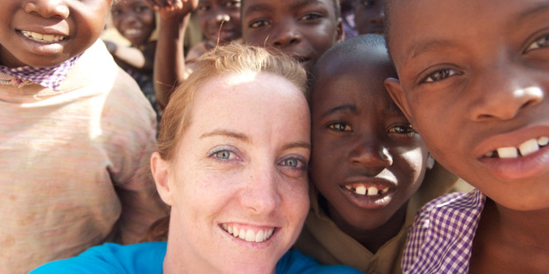 Sally Angelson with children in Mumbwa, Zambia, where the first ATLAS pilot was conducted. Photo / Supplied