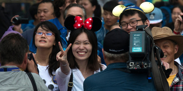Visitors flocked to the opening day of the Disney Resort in Shanghai, China. Photo / AP