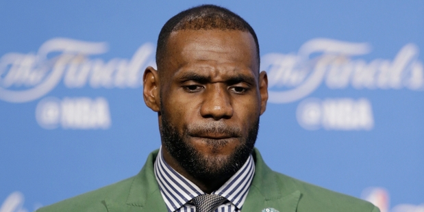 Cleveland Cavaliers' LeBron James answers a question after the Golden State Warriors defeated the Cavaliers. Photo / AP