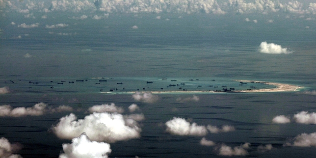 Seen from a military plane, China's alleged ongoing reclamation of Mischief Reef in the Spratly Islands in the South China Sea. Photo / AP