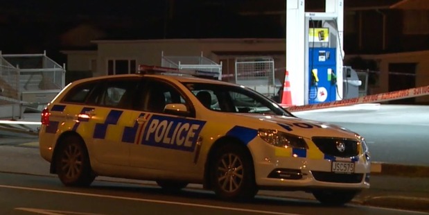 A police car outside the Mobil Forbury station. Photo / Supplied