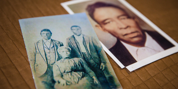 A photo of Patricia Bayonne-Johnson's great grandparents and their son (left) and a photo of another one of her great grandparents' sons (right). Photo / Nick Otto, Washington Post