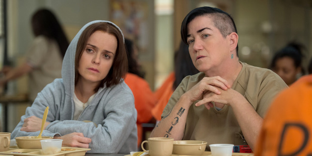 Tiffany 'Pennsatucky' Doggett (Taryn Manning), left, and Carrie 'Big Boo' Black (Lea DeLaria). Photo / Netflix