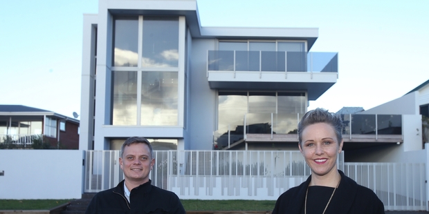 MAJOR DRAWCARD: Eves real estate agents Charlotte Gardner and Dirk Merwe sold 158 Oceanbeach Rd at Mount Maunganui for $5.65 million and say the property had attracted strong interest.PHOTOS/JOHN BORREN AND ALEX PORTEOUS - OPEN2VIEW