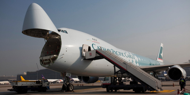 A Cathay Pacific Airways Boeing 747-8 freighter with the nose cargo door opened. Photo / Bloomberg