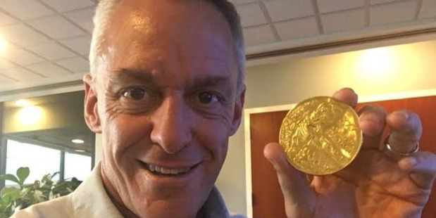 Joe Jacobi and his medal. Photo: Joe Jacobi / Washington Post