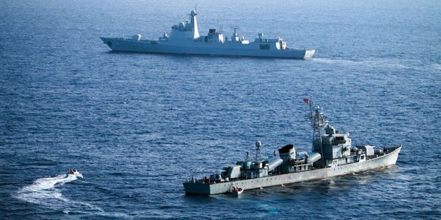 Crew members of China's South Sea Fleet taking part in a drill in the Xisha Islands, or the Paracel Islands in the South China Sea. Photo / AFP