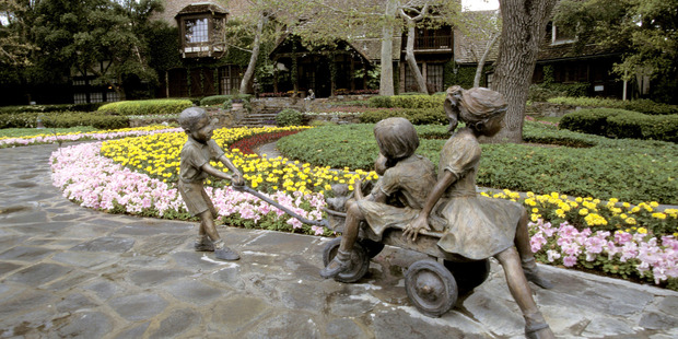 Exterior views of the entrance, house, statues and gardens at Michael Jackson's Neverland Ranch, 1995. Photo / Getty Images