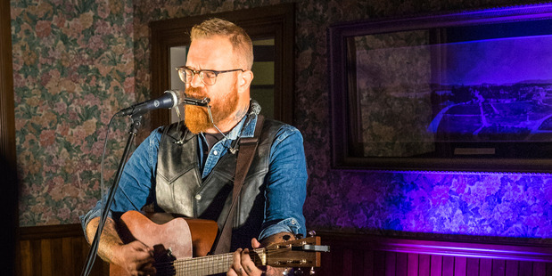 The crowd loved folk singer Adam McGrath when he performed at the Te Runanga Tea Rooms last year. PHOTO/MEAD NORTON