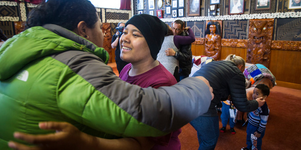Formerly homeless teen known as B and her family receive a karakia and farewell for the family at Te Puea Marae. Photo / Jason Oxenham