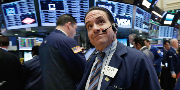 Trader Tommy Kalikas works on the floor of the New York Stock Exchange. Photo / AP