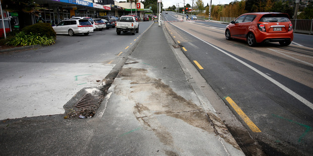 Police say a fleeing vehicle turned directly into the path of a patrol car on Otaika Rd, where the driver, the sole occupant, was thrown from his vehicle after a collision. Photo / Michael Cunningham