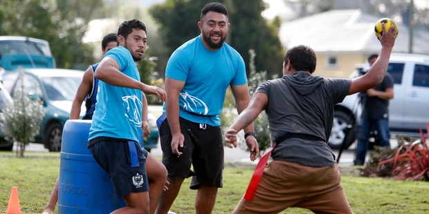 Taniwha players Tumama Tuulua and Phil Kite protect the centre of the field from Hamiora Hohaia from NorthTec. Photo / Michael Cunningham