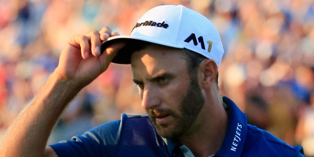 Dustin Johnson of the United States celebrates on the 18th green after winning the U.S. Open. Photo / Getty Images.