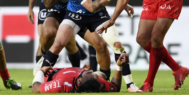 RC Toulon's New Zealand centre Maa Nonu lays on the pitch after a tackle. Photo / Getty Images