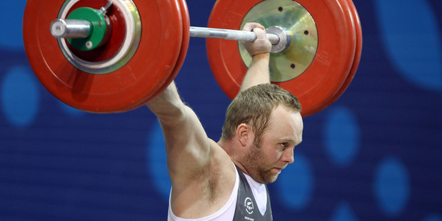 Richie Patterson of New Zealand in action in the 85kg men's weightlifting event. Photo / Getty