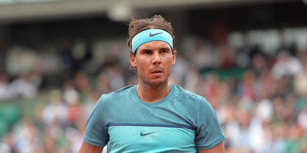 Rafael Nadal reacts during his French Open match against Facundo Bagnis. Photo / Getty Images