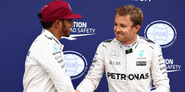 Lewis Hamilton and Nico Rosberg talk in parc ferme during the Canadian Grand Prix. Photo / Getty Images