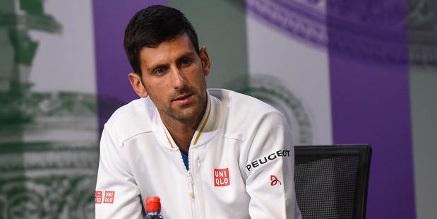 Novak Djokovic speaks to the media during a press conference prior to Wimbledon. Photo / Getty Images