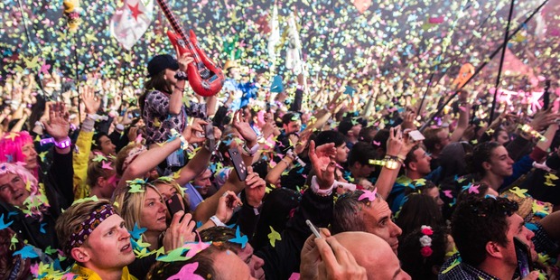 The crowd enjoys the show as Coldplay perform at the Glastonbury Festival. Photo / Getty Images