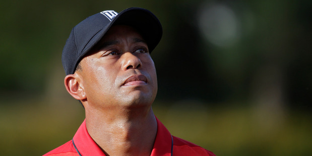 Tiger Woods during the trophy presentation at the Quicken Loans National. Photo / Getty Images