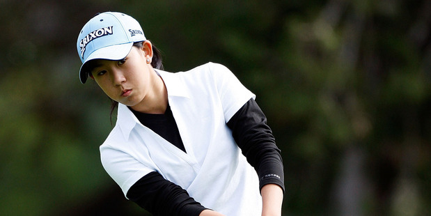 Liv Cheng chips the ball onto the green during the New Zealand Women's Amateur Champs. Photo / Getty Images