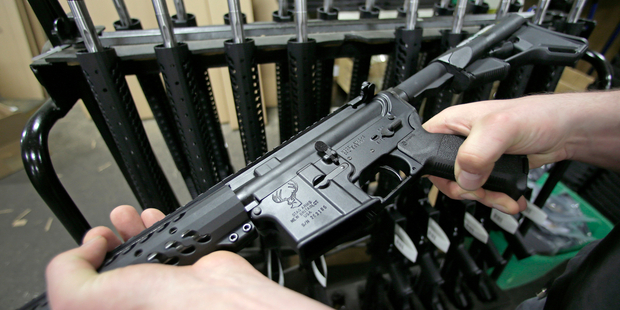 An AR-15 like the one Second Amendment Sports is raffling to benefit the victims of the Orlando nightclub shooting. Photo / AP
