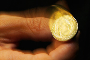 The kiwi touched a high of 71.36 US cents early this morning, and was trading at 71.03 cents at 8am in Wellington, from 70.82 cents at 5pm yesterday.