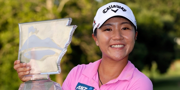 Lydia Ko displays the trophy after winning the Walmart NW Arkansas Championship. Photo / Getty Images