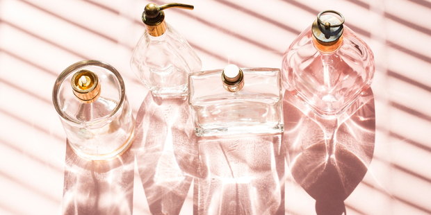 Experts recommend covering up your pretty perfume bottles. Photo / iStock