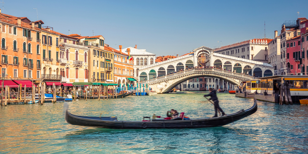 Abta's Mark Tanzer warns that large numbers of visitors to cities such as Venice (pictured) can have a detrimental effect. Photo / iStock