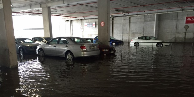 Flooded carpark building at Dress Smart in Onehunga. Photo / Emma Harford