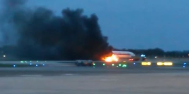 A Singapore Airlines flight to Milan has caught fire after returning to Singapore's Changi Airport. Photo / YouTube
