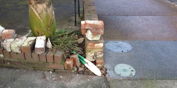 This electrician put the wires from the building to our boundary wall deep down and rather than digging under the wall. Photo / Supplied